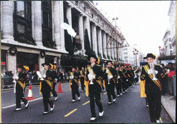 Marching Band Performing in Parade (Part of the NMU Historic Photographs Collection)