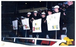 Sound Machine Band Performing Behind Signs (Part of the NMU Historic Photographs Collection)