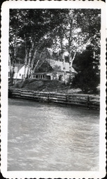 Water, Seawall, and House