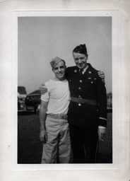 Tom Ross in Garrison Cap with Officer