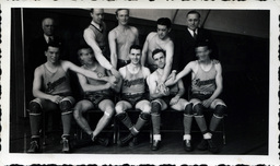 Legionaires Basketball Team Holding Hands