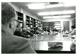 Group of People Eating at Conference Table (Part of the NMU Historic Photographs Collection)