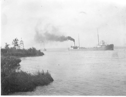 Steamboat towing barge