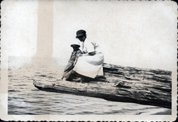 Woman and Child on Driftwood