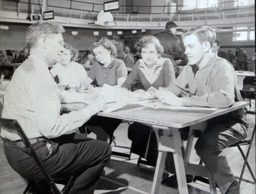 Class Registration--Dr. Schaeffer 1951: Dr. Schaeffer Helping Four Students at Class Registration