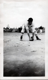 Baseball Player Catching a Ground Ball