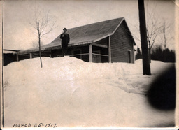 Man Standing on Snowbank