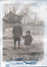 Boy and Toddler in Winter Clothing