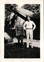 Man in Military Uniform and Civilian