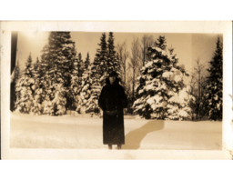 Person Standing in Snow