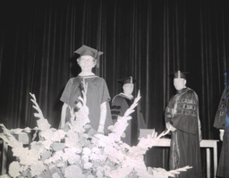 Summer Commencement 1960: Woman Standing Smiling