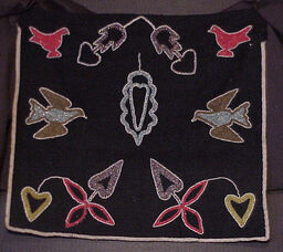 Beaded apron with floral motif