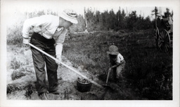 Young Tom Ross and Father Digging Potatoes (1 of 2)