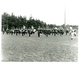 Band Practicing High Steps in Field (Part of the NMU Historic Photographs Collection)