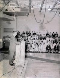 Student Convocation--Effects of Budget May 1961: Side View of Speaker Addressing Crowd of Students