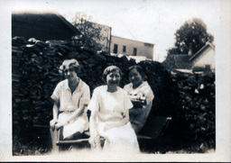 Three Women on Cart