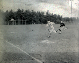 Football ca. 1960: #24 Misses Catching the Ball