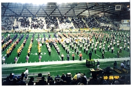 Multiple Marching Bands Playing in the Superior Dome (Part of the NMU Historic Photographs Collection)