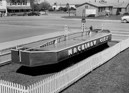 Miniature of Mackinac Bridge used as sign