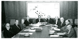 John X. Jamrich and Group in Front of Map of Campus (Part of the NMU Historic Photographs Collection)