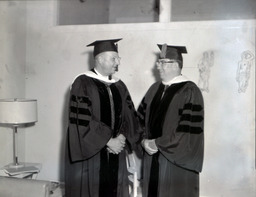 Summer Commencement 1960: Two Gentleman Standing Smiling