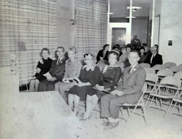 West Hall Dedication Fall 1960: Four Women, Two Men Sitting in Front Row (Different Lighting)