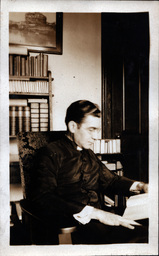 Priest in Study