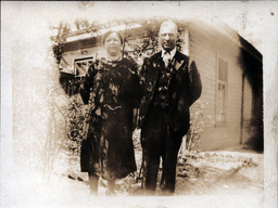 Man and Woman in Front of Trellis