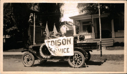 People in Edison Service Car