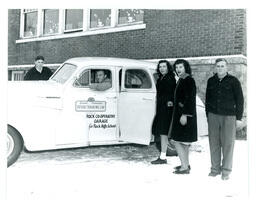 Students with Rock High School Driver Training Car (Part of the NMU Historic Photographs Collection)