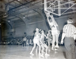 Basketball--NMC vs. St. Norbert Feb. 24, 1961: College Basketball Players by Net