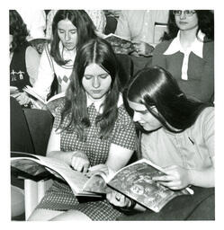 Closeup of Women Looking at Sheet Music (Part of the NMU Historic Photographs Collection)