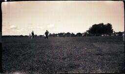 (016-017) Men Playing Softball (or Baseball) in Field