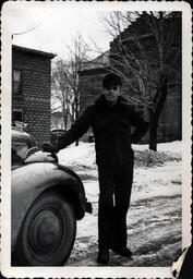 Tom Ross Leaning on Car Hood