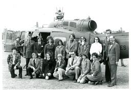 Jamrich and Large Group of People Posing next to Helicopter (Part of the NMU Historic Photographs Collection)