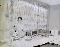 Graduate Luncheon 1958: Woman Posed with Buffet Setting