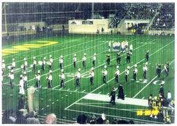 Marching Band Lining up on Football Field (Part of the NMU Historic Photographs Collection)