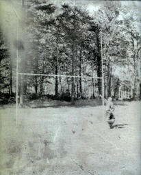 F. L. Ferzacca and Joe Kind Football Practice Field 1960: Another View of Men Standing with Goal Post