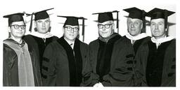 John X. Jamrich and Five Unknown Men in Academic Robes (Part of the NMU Historic Photographs Collection)