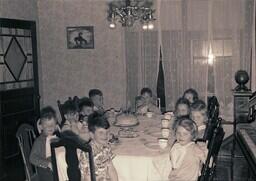 (013-005) Ten Children Seated at Table