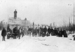 Lumbermen with Loads of Timber