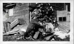 Young Tom Ross with Deer Carcass