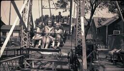 (008-027) Woman and Children Riding Ferris Wheel