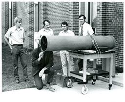 Group of Men Look at Telescope (Part of the NMU Historic Photographs Collection)