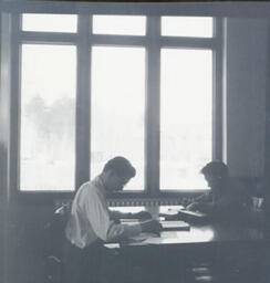 (120-02) Former Campus Scenes: Two Students at Work