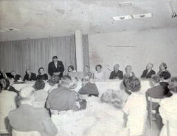 Retirement Dinner -- Mr. Hurstand and Mr. Meyland: Photo of Retirees and Crowd