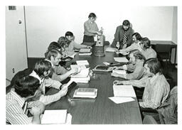 Group of Students at Conference Table (Part of the NMU Historic Photographs Collection)