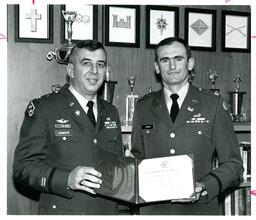 Schweppe and Jajich Holding Award Together (Part of the NMU Historic Photographs Collection)