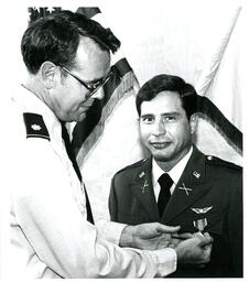 Man Pinning Medal onto Another Man (Part of the NMU Historic Photographs Collection)