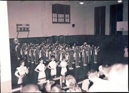 (022-003) Marching Band and Baton Twirlers Performing in Gymnasium (1 of 2)